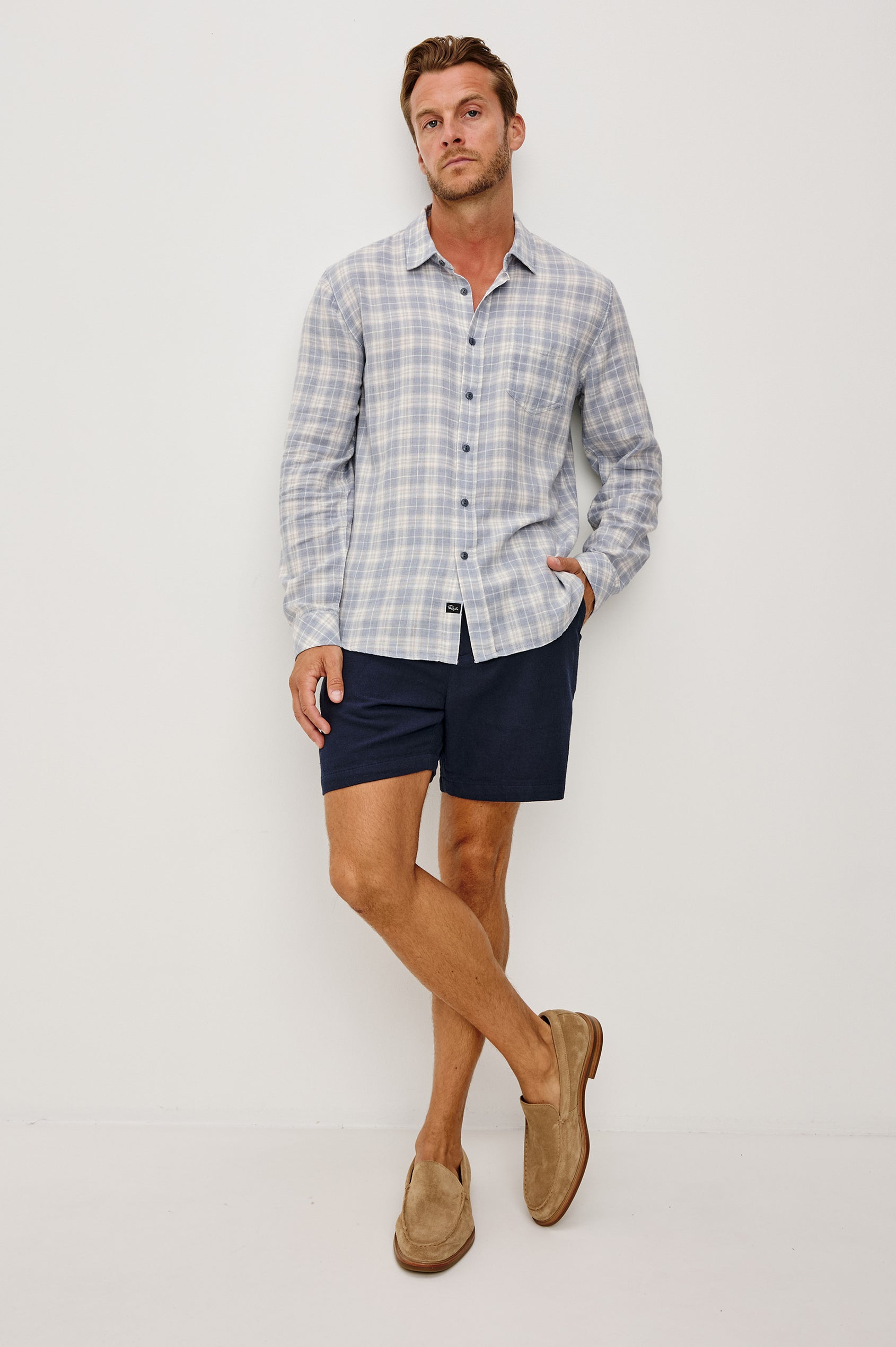 Wyatt Button Front Shirt in Soft Cotton Slub With Collar, Chest Patch Pocket, Long Sleeves, and Relaxed Fit in Cloud Cream Colorway - Full Body Front View Featured on Model