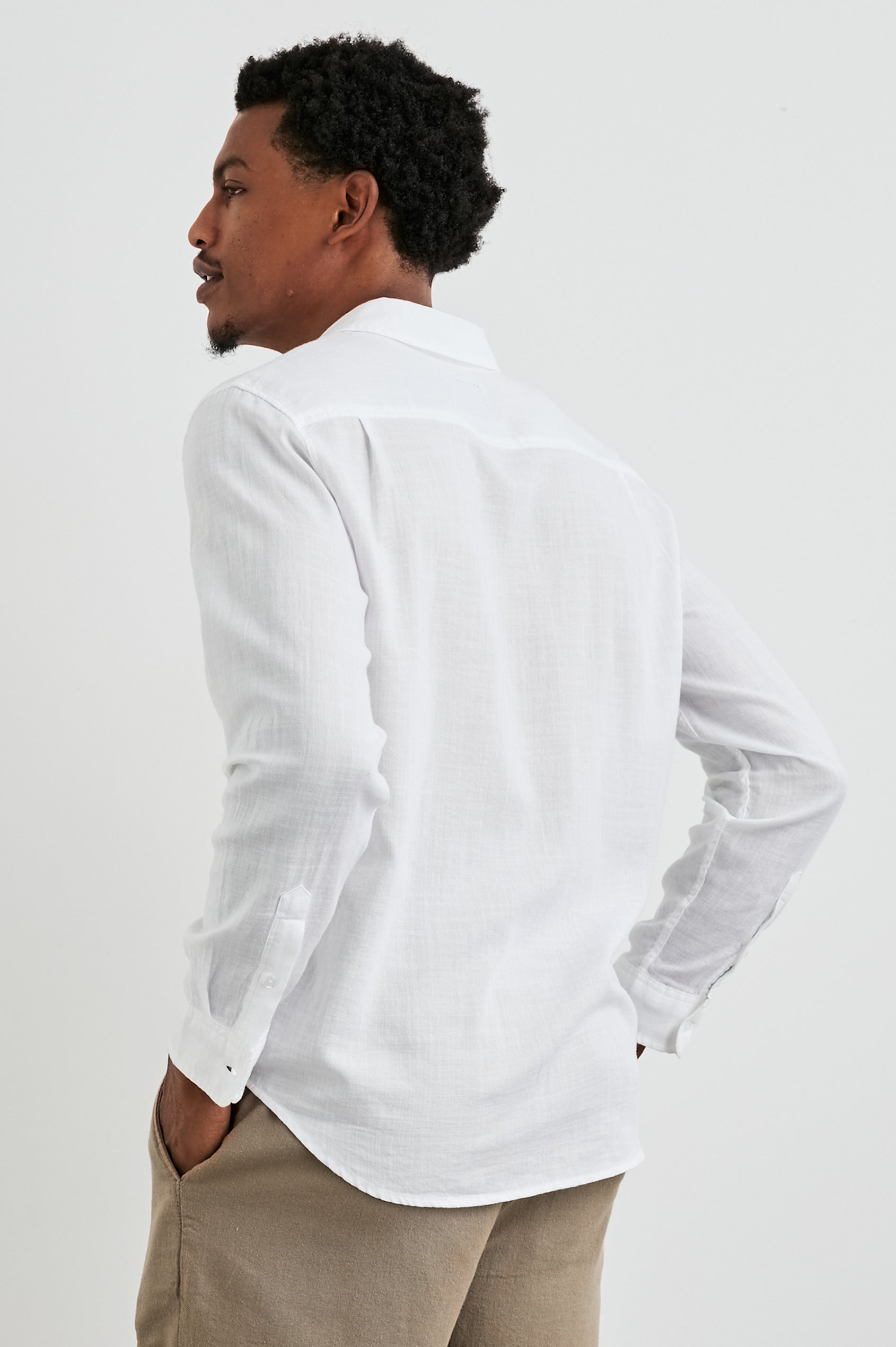 Wyatt Classic Button Up Long Sleeve Shirt with collar and front chest pocket in White - back view on model