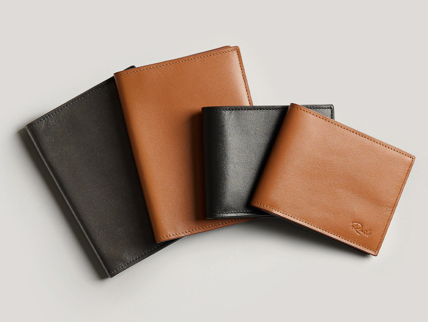 Men's  <span class="GT_reg_italic">Leather Goods</span>