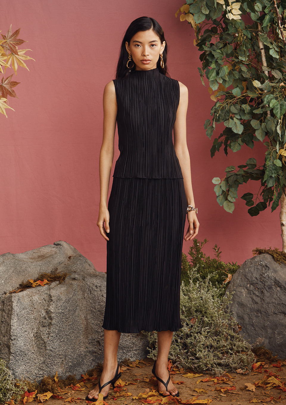 FRONT FULL BODY IMAGE OF MODEL WEARING TREA TOP AND STELLA SKIRT