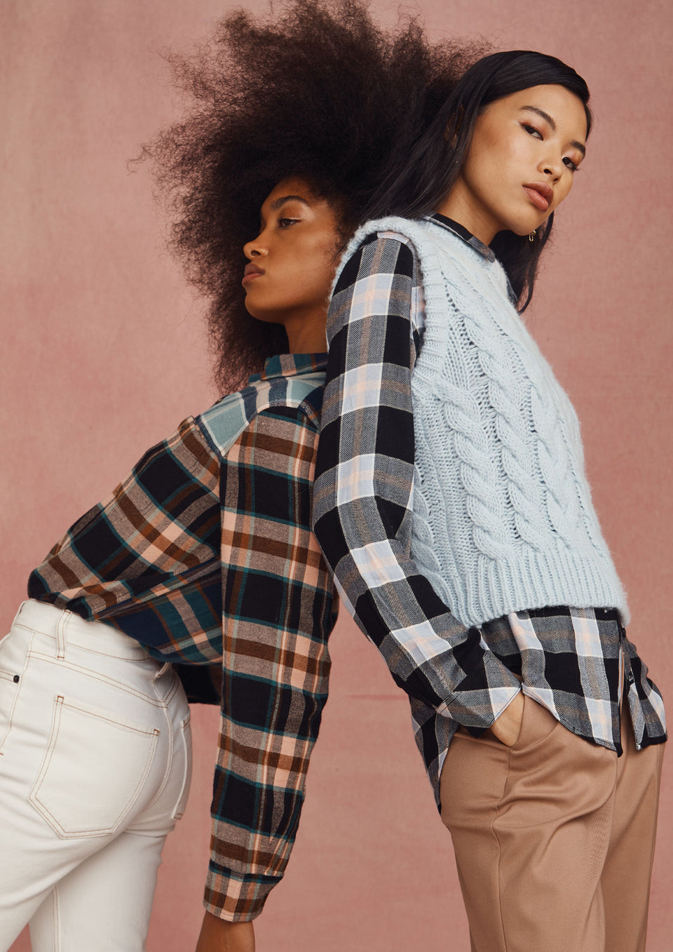 TWO MODELS STANDING BACK TO BACK WEARING HUNTER SHIRT AND ALEXIS SWEATER VEST