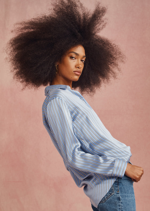 EDITORIAL SIDE IMAGE OF MODEL WEARING SPENCER SHIRT 