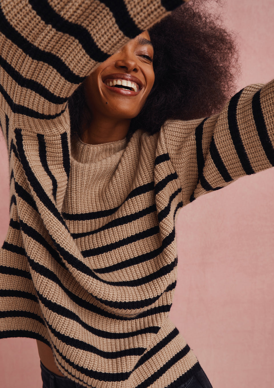 EDITORIAL DETAIL SHOT OF MODEL WEARING CLAUDIA SWEATER