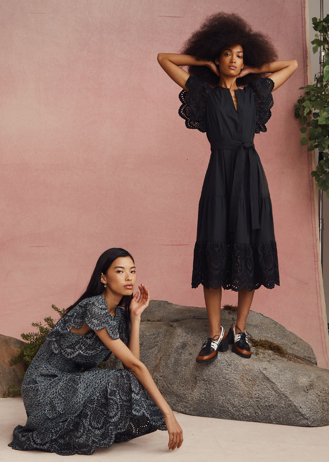 TWO MODELS. FIRST MODEL IS WEARING KYRA DRESS AND KNEALING. SECOND MODEL IS WEARING GIA DRESS AND STANDING