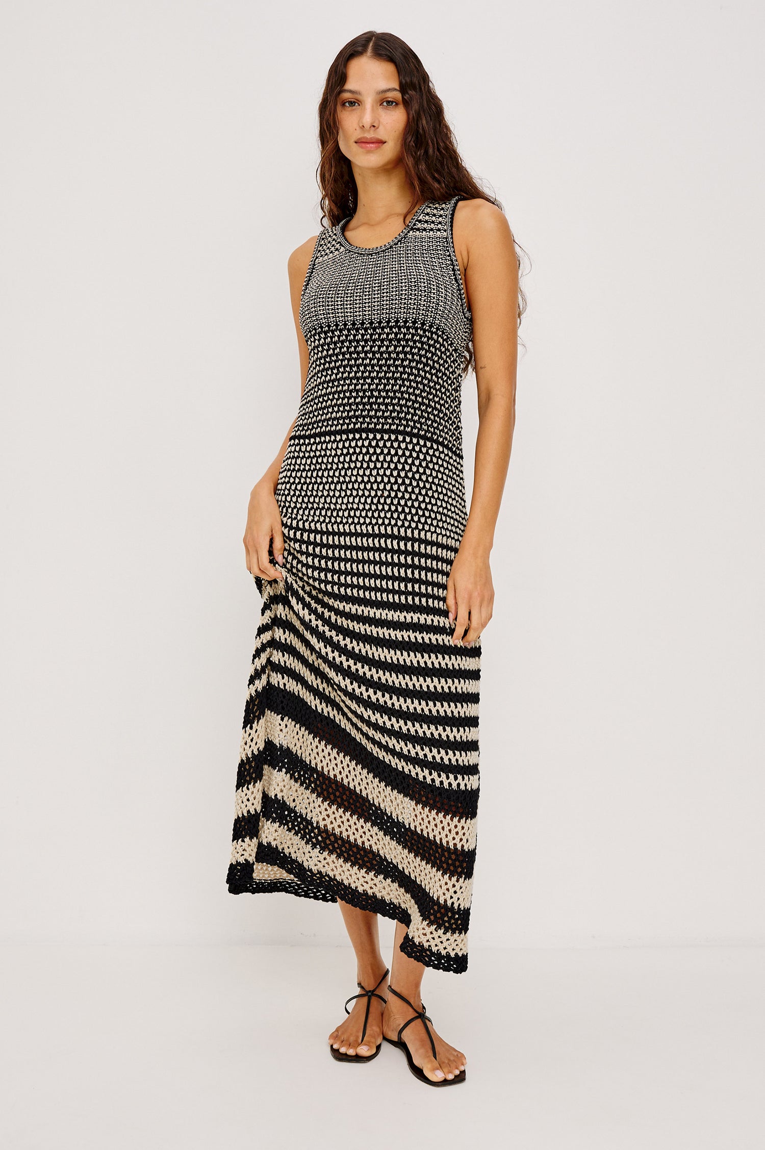 Yvette Maxi Dress in Cotton Knit With Scoop Neckline, Slightly Fitted at Top With A-Line Body, Side Slits, and Jersey Lining in Onyx Ivory Stripe Colorway - Full Body Front View Featured on Model