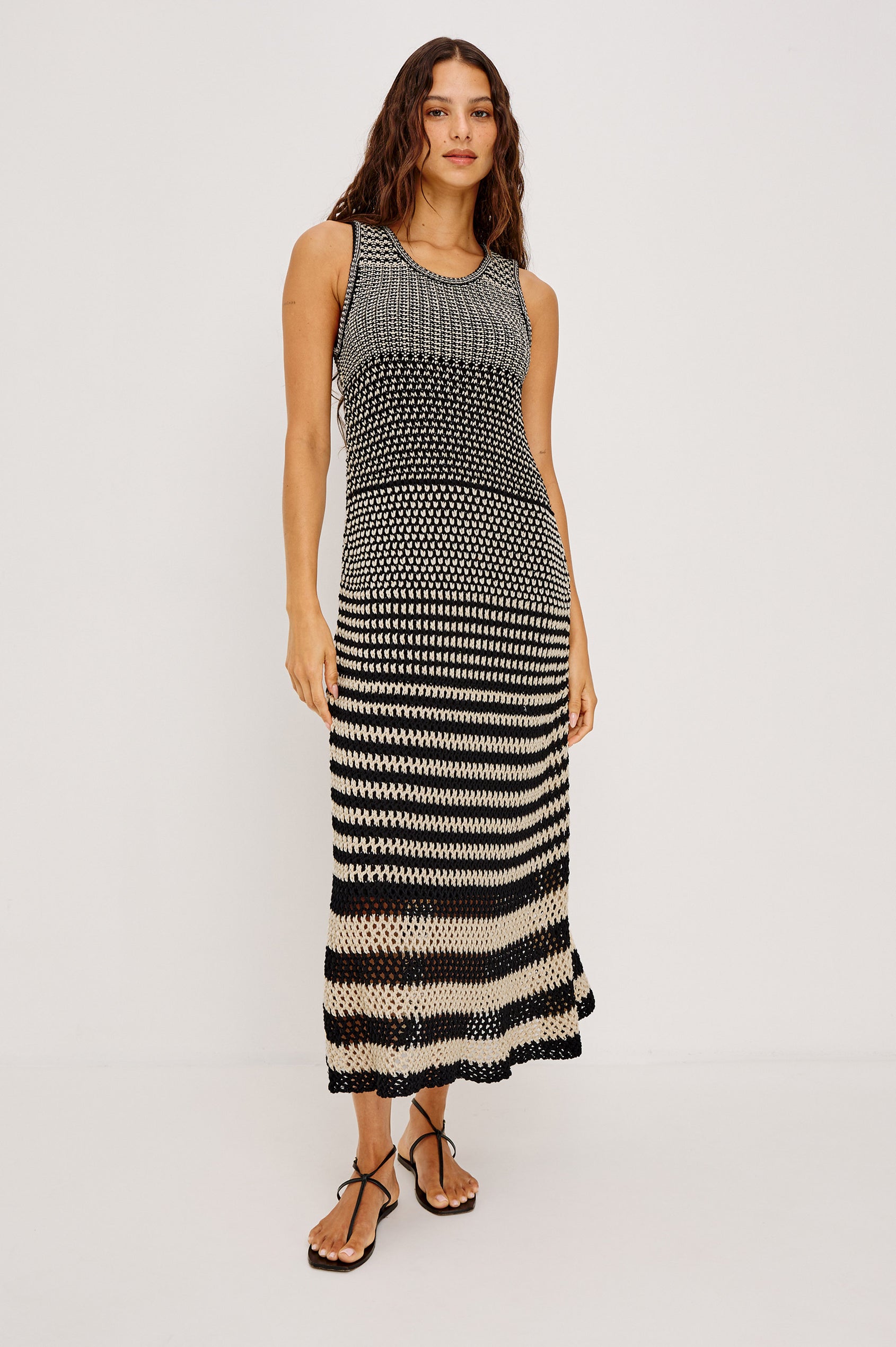 Yvette Maxi Dress in Cotton Knit With Scoop Neckline, Slightly Fitted at Top With A-Line Body, Side Slits, and Jersey Lining in Onyx Ivory Stripe Colorway - Full Body Front View Featured on Model