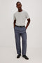 Zimmer Pant in Cotton Linen Wool Blend With Relaxed Fit, Tapered Leg, Side Pockets, Zip Fly, Belt Loops, and Back Welt Pockets in Meridian Colorway - Full Body Front View Featured on Model