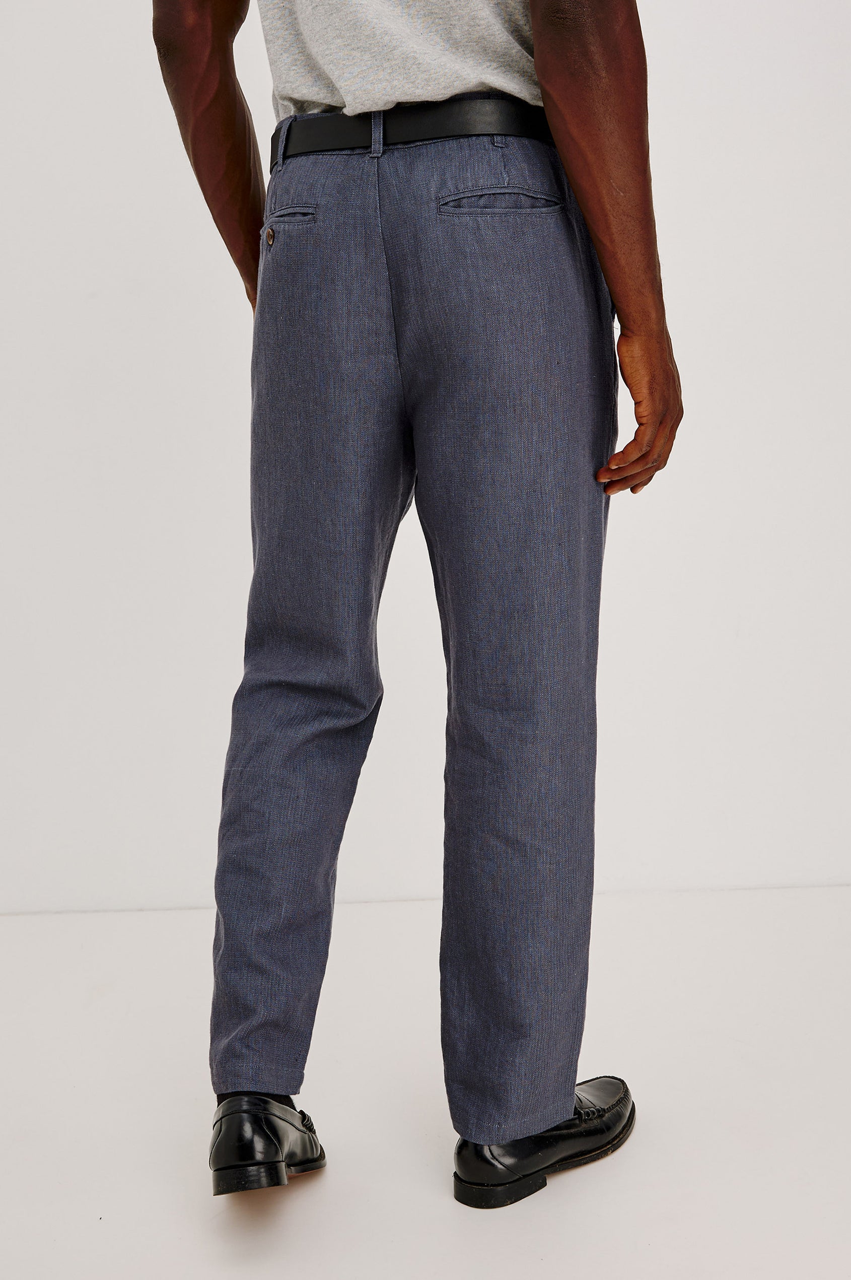Zimmer Pant in Cotton Linen Wool Blend With Relaxed Fit, Tapered Leg, Side Pockets, Zip Fly, Belt Loops, and Back Welt Pockets in Meridian Colorway - Lower Body Back View Featured on Model