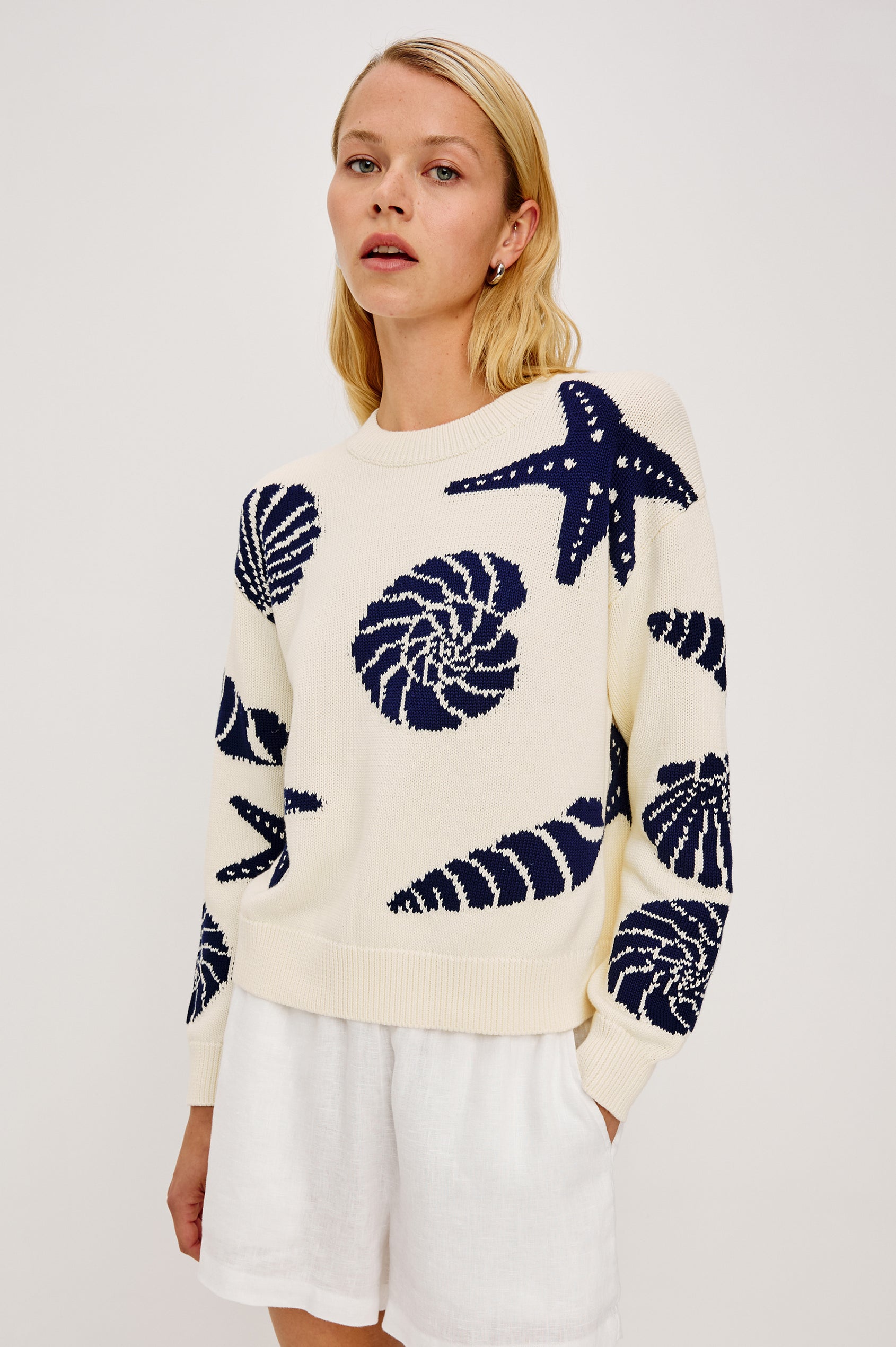Zoey Crewneck Sweater in Cotton Blend Knit With Seashell Embroidery, Long Sleeves, Relaxed Fit, and Ribbed Trim - Upper Body Front View Featured on Model