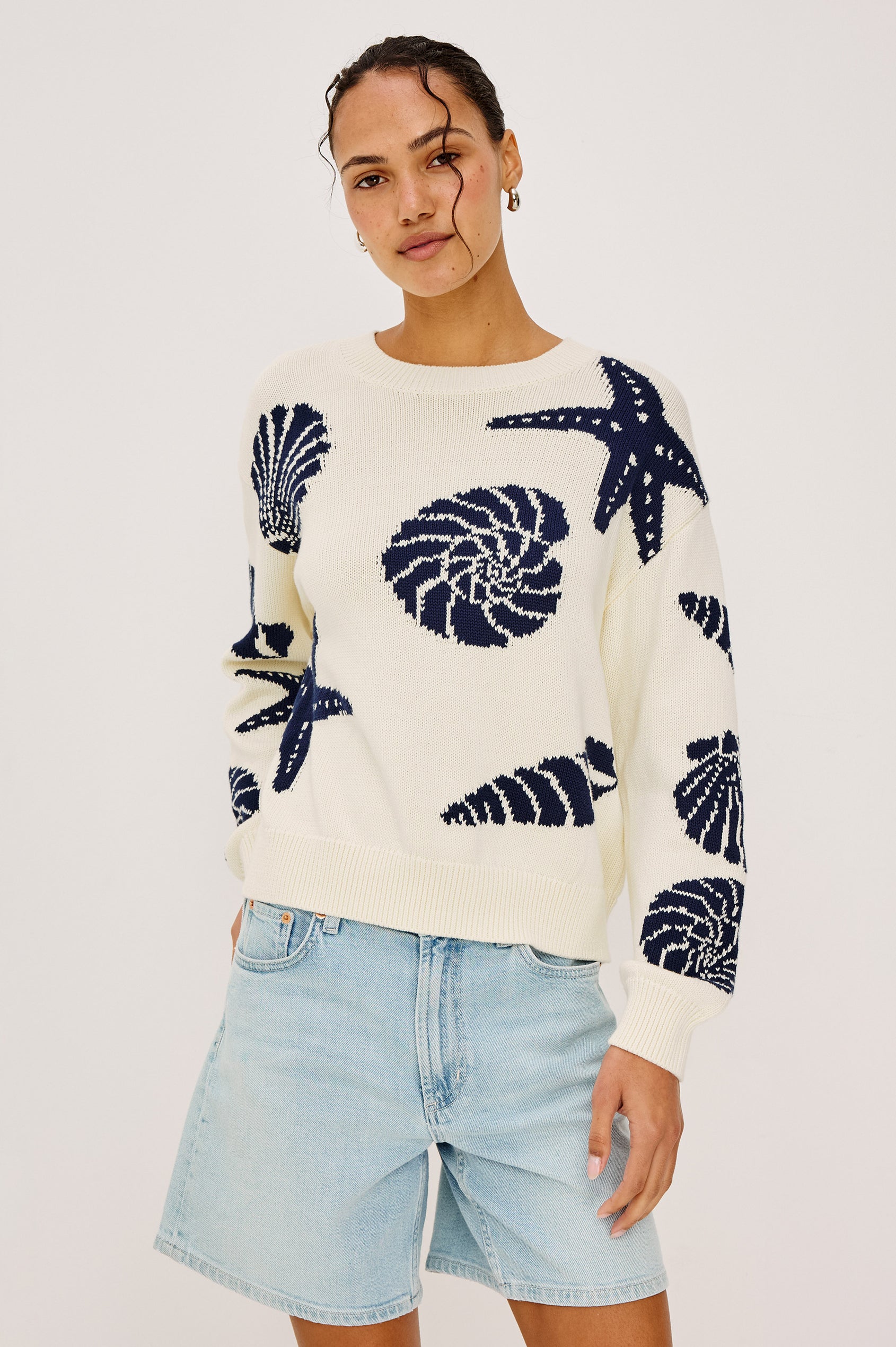 Zoey Crewneck Sweater in Cotton Blend Knit With Seashell Embroidery Long Sleeves Relaxed Fit and Ribbed Trim - Upper Body Front View Featured on Model