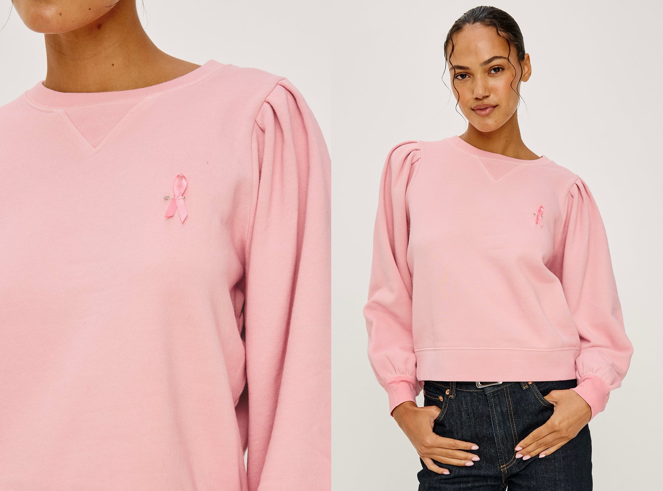 Female model wearing a pink sweatshirt with pink breast cancer awareness ribbon