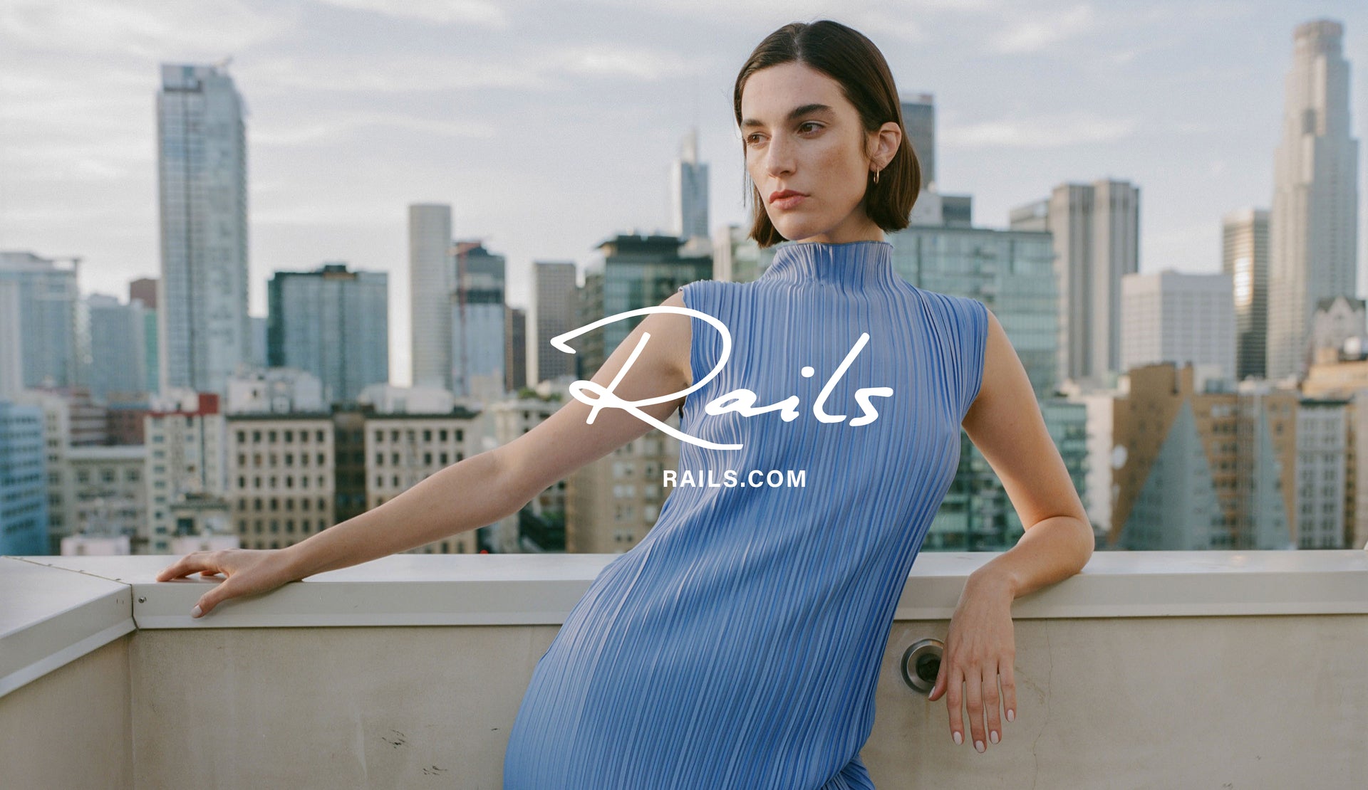 EDITORIAL IMAGE OF MODEL WEARING WAKELY DRESS IN JEWEL