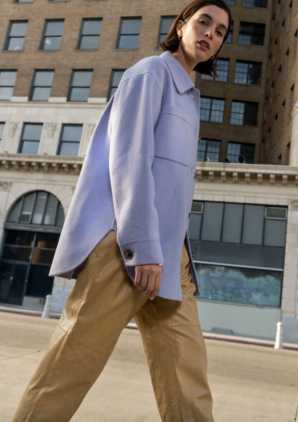 EDITORIAL SIDE SHOT OF MODEL WEARING CONNIE SHIRT JACKET IN LILAC 