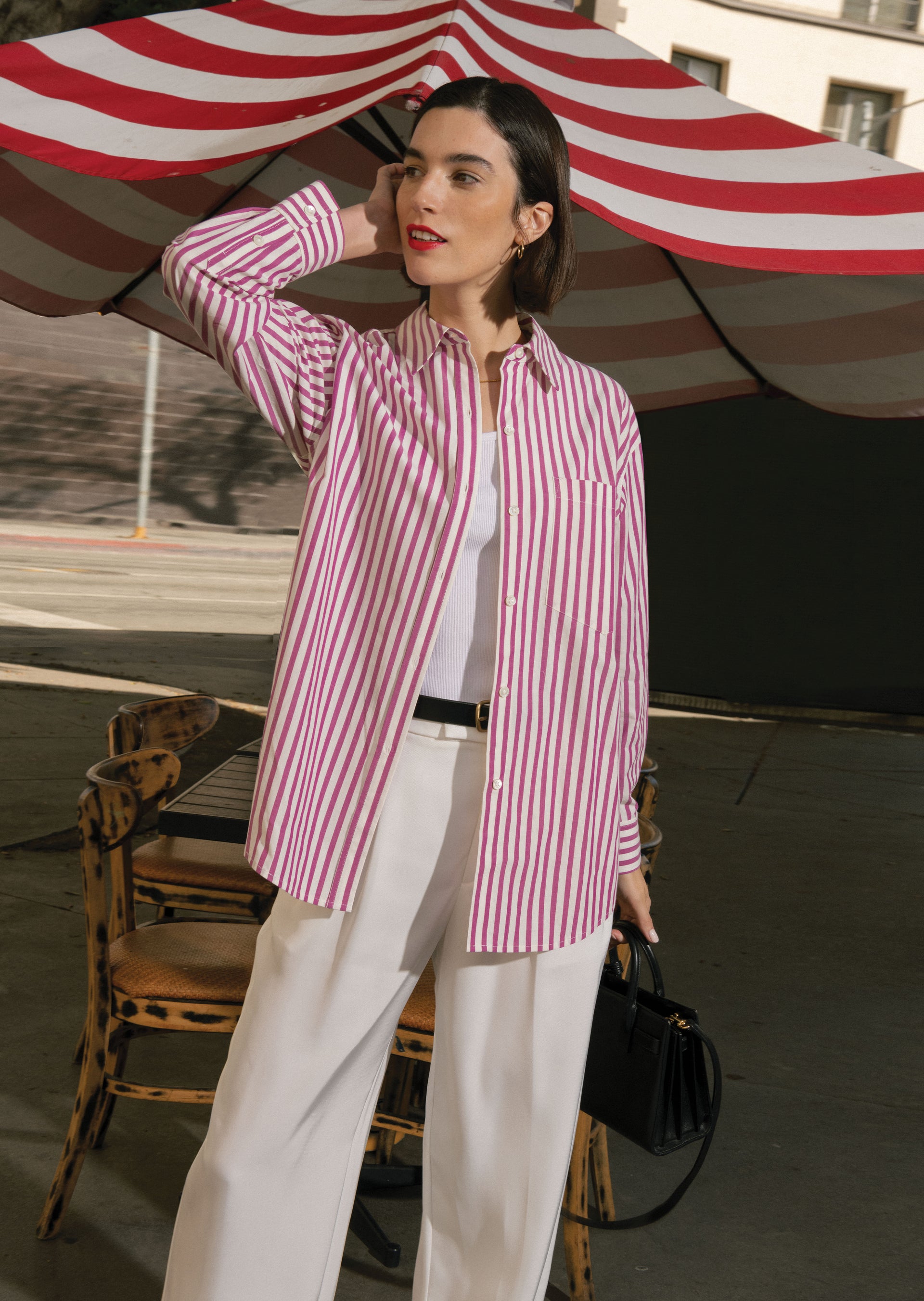 EDITORIAL FRONT SHOT OF MODEL WEARING ARLO SHIRT IN CALI STRIPE AND MARNIE PANT IN SEA SALT