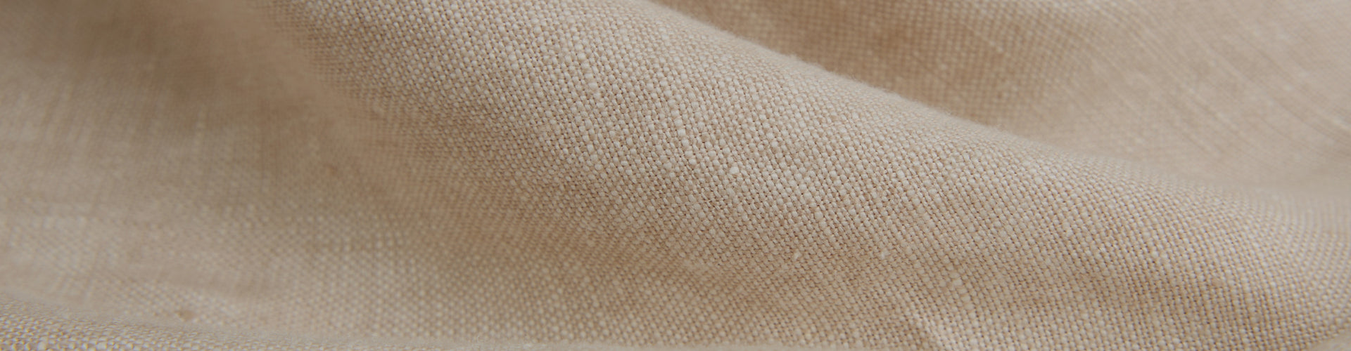 Close-up of beige fabric texture