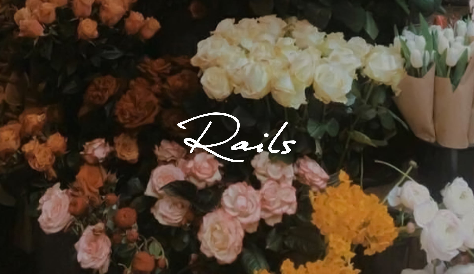 Bouquets of flowers with 'Rails' logo overlayed