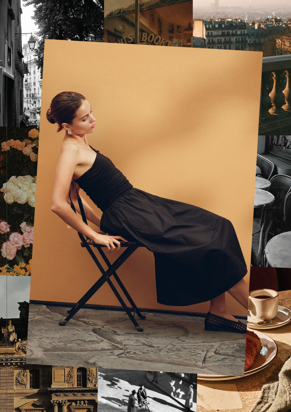 Woman in a black dress sitting on a stool against an orange background.