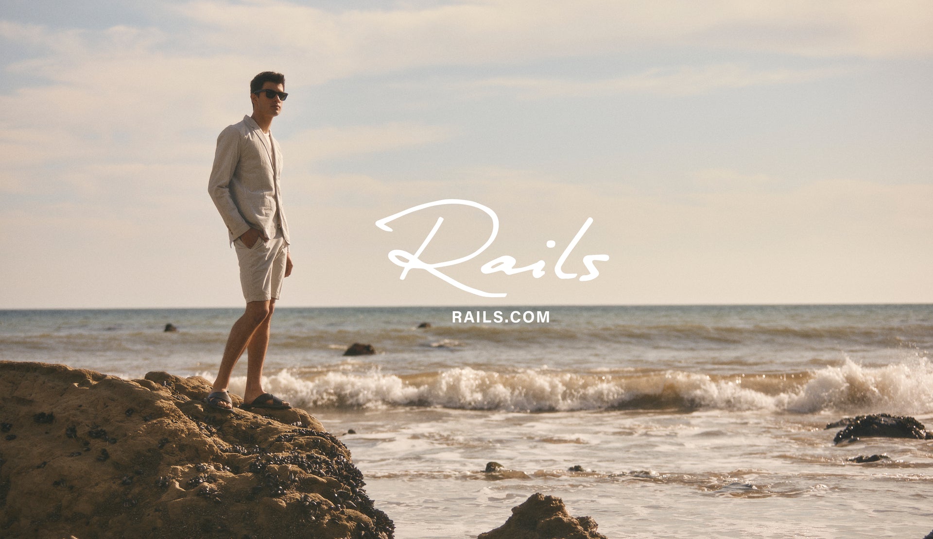 Rails Banner Showing full body editorial image of model wearing Sorrento Blazer and Arsene Shorts