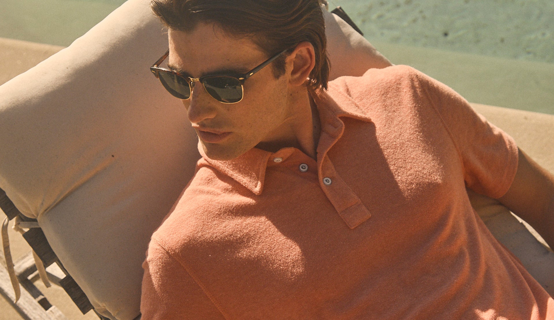 CLOSE UP EDITORIAL IMAGE OF RHEN POLO SHIRT IN DRAGON FRUIT