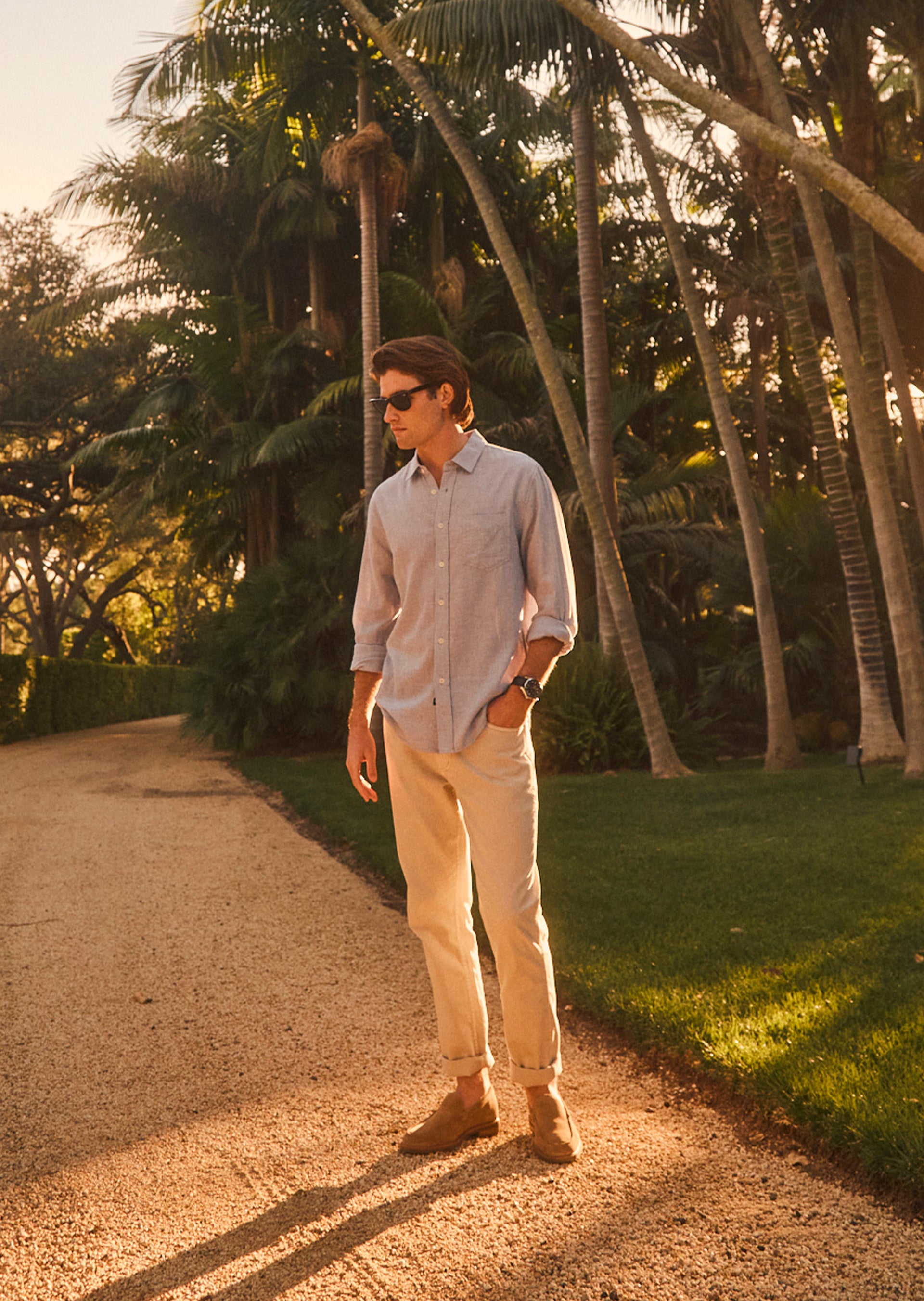 FRONT FULL BODY EDITORIAL IMAGE OF MODEL WEARING WYATT SHIRT IN IRON GATE AND CARVER PANT IN STONE