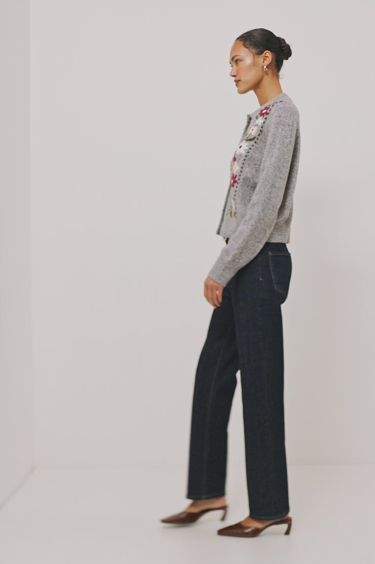 Millie Cardigan in Wool Blend Knit With Slightly Cropped Relaxed Fit, Crew Neck, Front Buttons, Long Sleeves, and Ribbed Trim in Grey Flora Colorway - Video - Full Body Front View Featured on Model