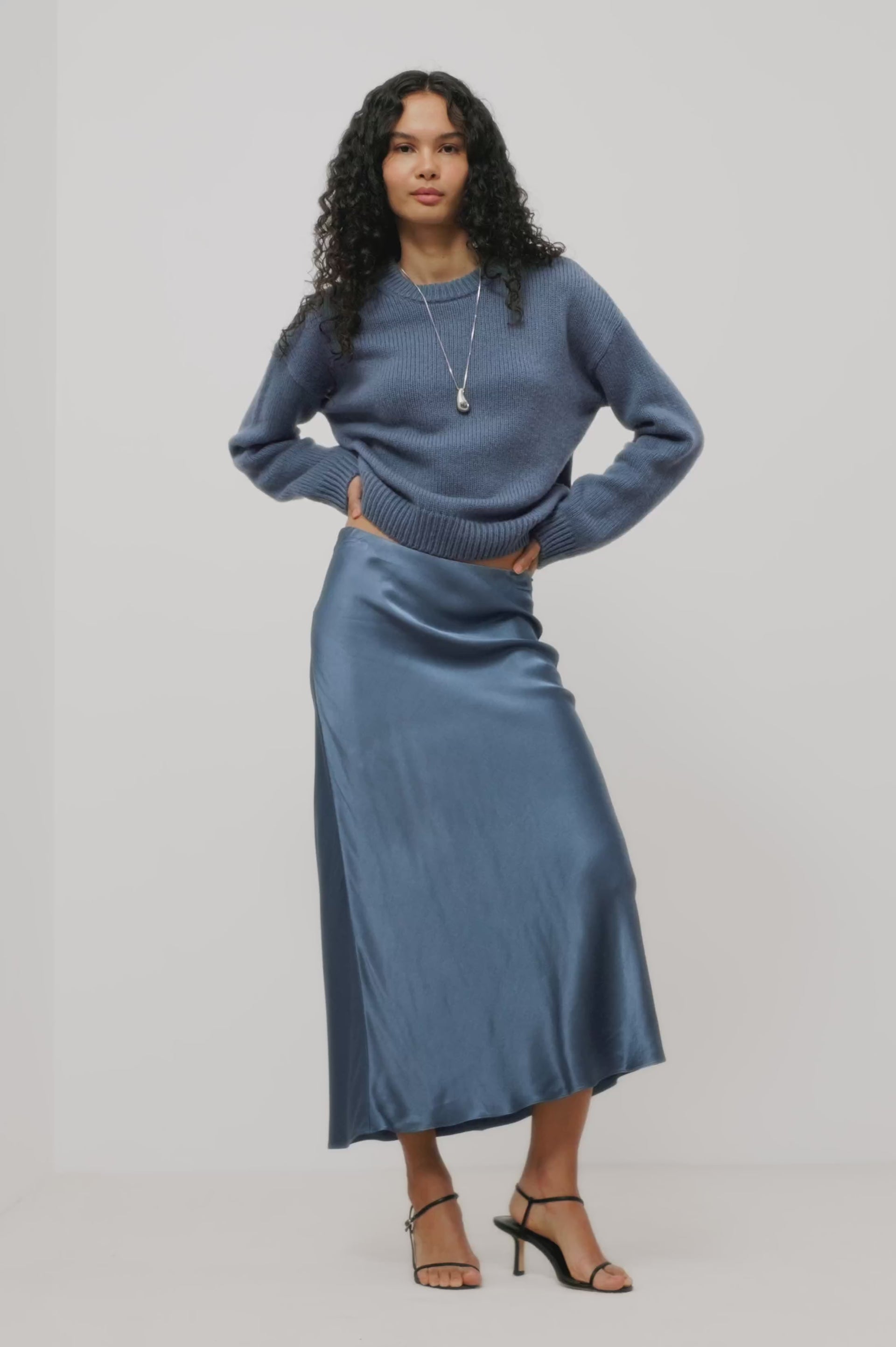 Helly Sweater in Wool-Cashmere Blend With Crew Neckline, Relaxed Boxy Slightly Cropped Fit, Long Sleeves, and Ribbed Trim in Atlantic Colorway - Full Body Front View Featured on Model - Video