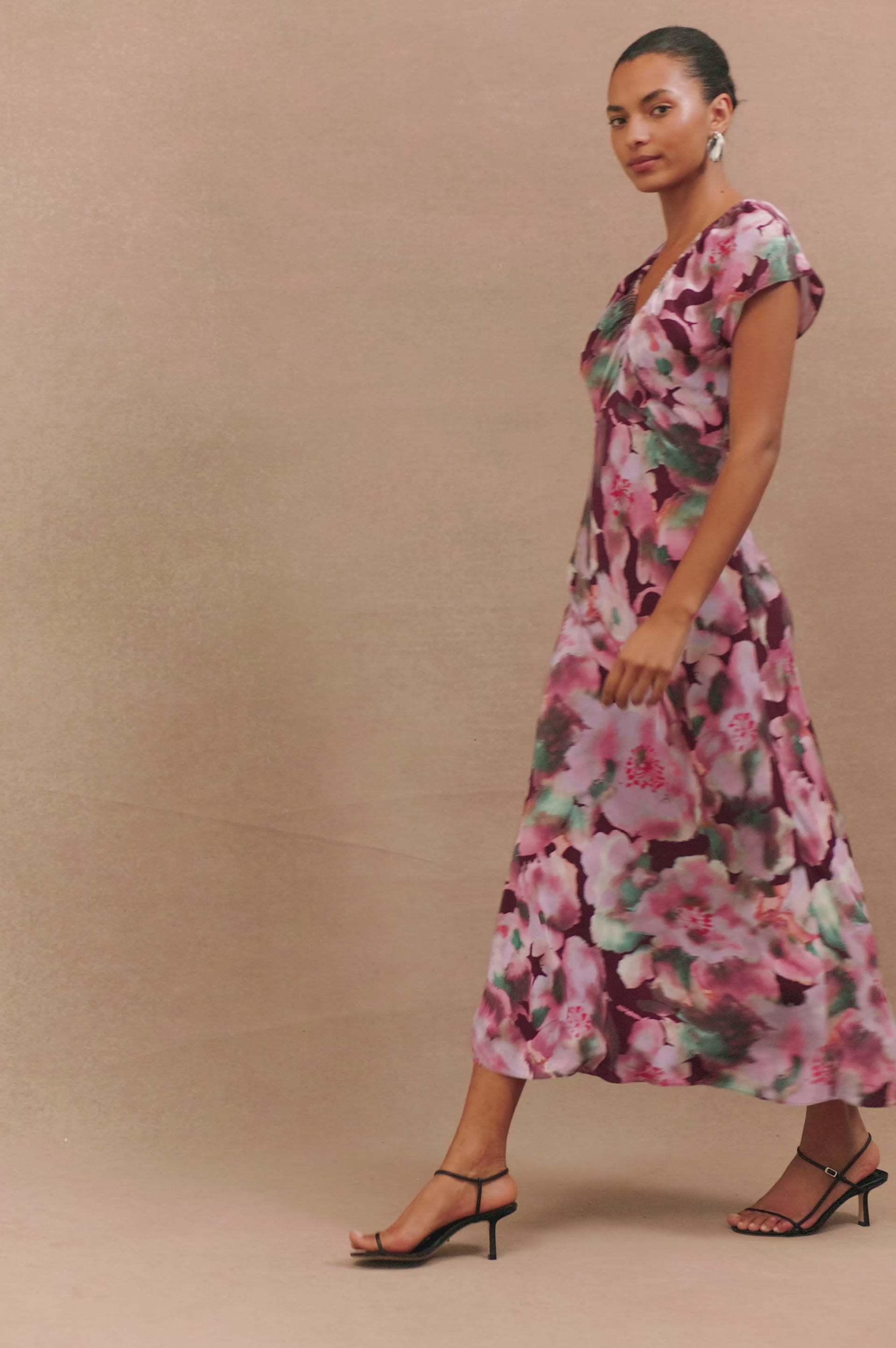 Kourt is a body-skimming midi dress, features a bias-cut skirt, ruching details, and a side zipper. Full body video, full 360 view featured on model.