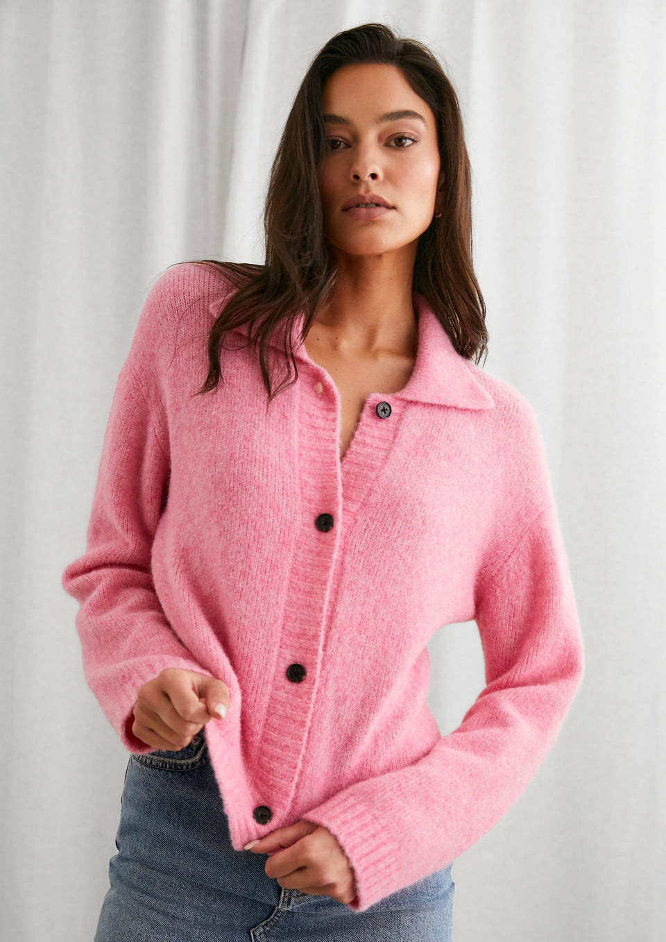 FRONT IMAGE OF MODEL WEARING AMBER SWEATER