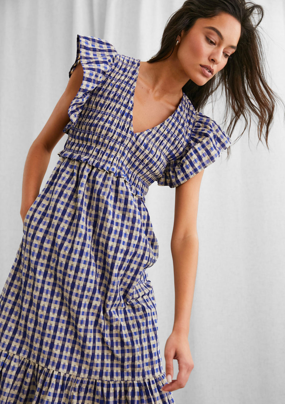 DETAIL IMAGE OF MODEL WEARING CLEMENTINE DRESS