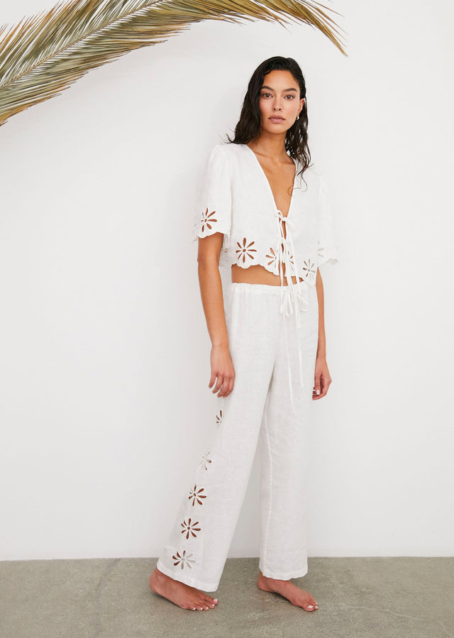 FRONT FULL BODY IMAGE OF MODEL WEARING PARI TOP AND EMMIE PANT