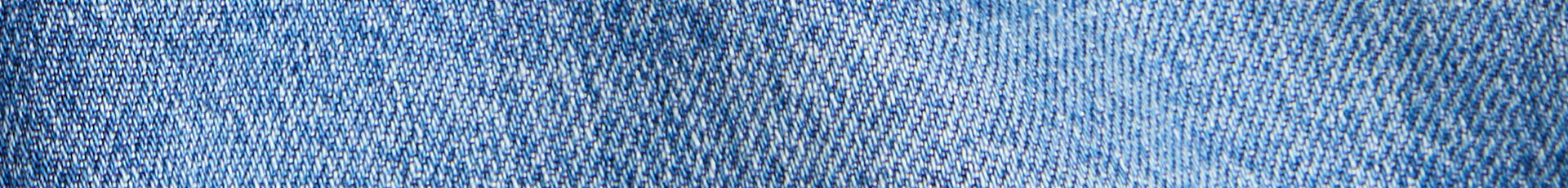 Close-up of blue denim fabric texture