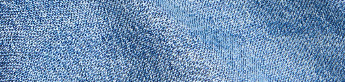 Close-up of blue denim fabric texture