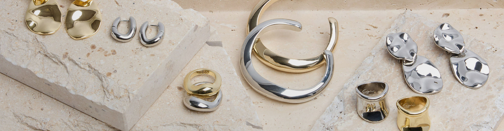 Variety of mixed gold and silver jewelry 