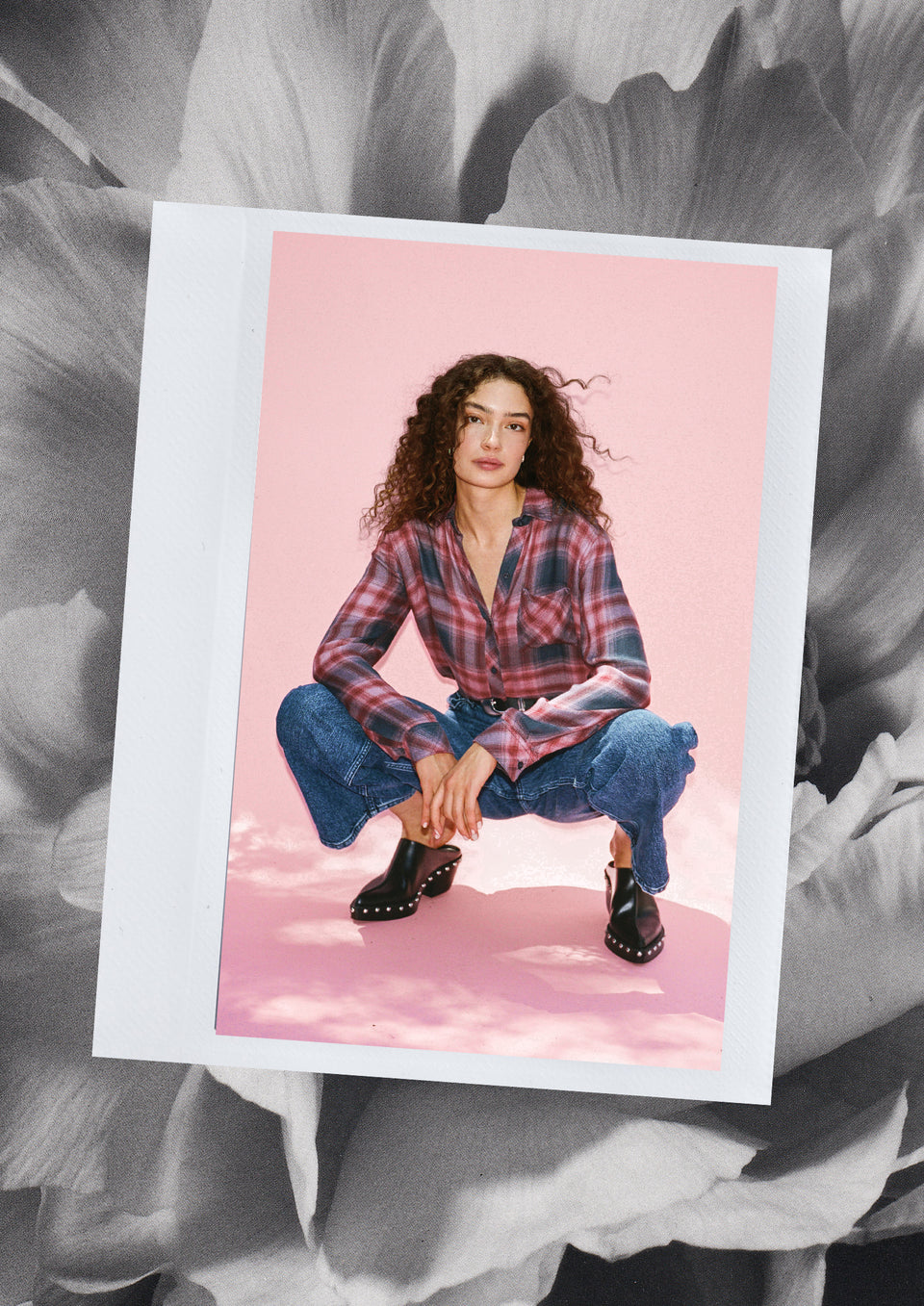 EDITORIAL IMAGE OF MODEL WEARING HUNTER SHIRT AND GETTY WIDE LEG JEANS