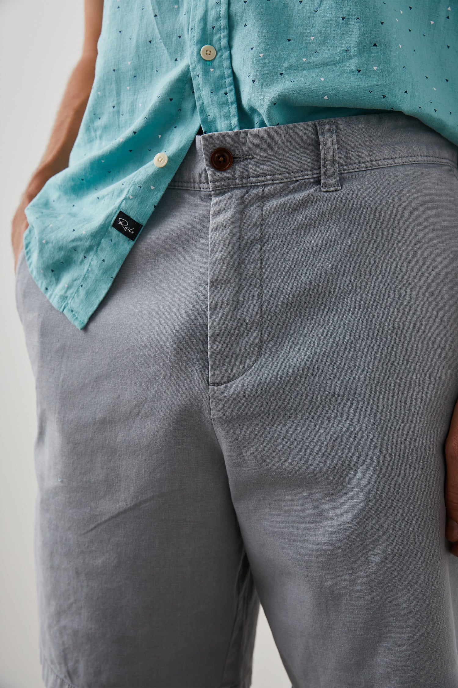 Boden Knee-Length Shorts with Belt Loops, Two Front Pockets and Two Back Button Welt Pockets in Gravel Colorway - Front View Featured on Model