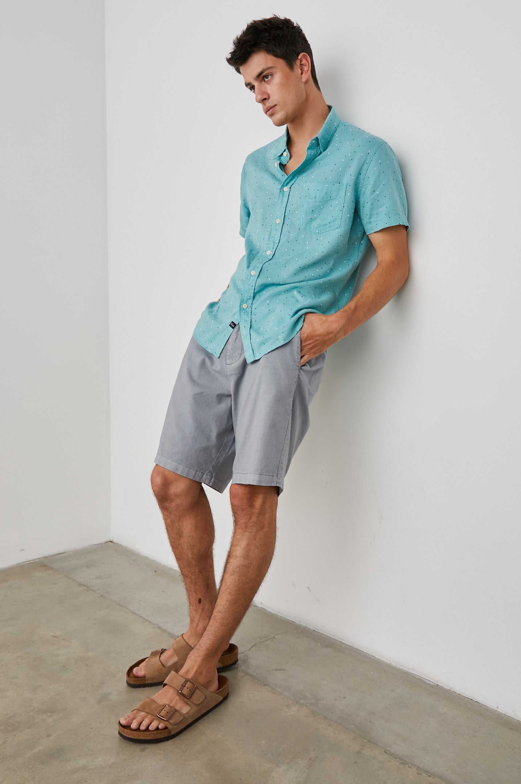 Boden Knee-Length Shorts with Belt Loops, Two Front Pockets and Two Back Button Welt Pockets in Gravel Colorway - Front Full Body View Featured on Model