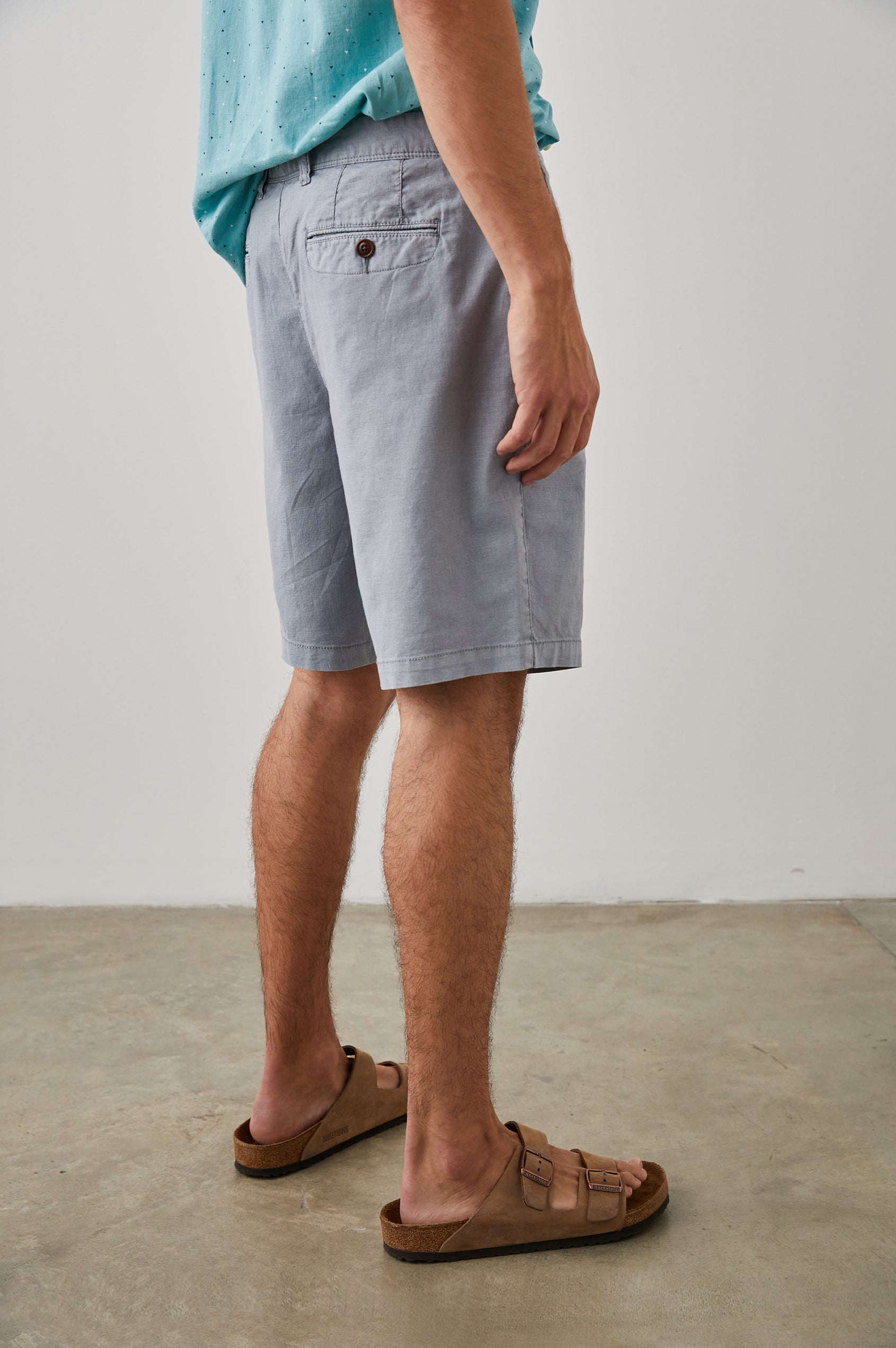 Boden Knee-Length Shorts with Belt Loops, Two Front Pockets and Two Back Button Welt Pockets in Gravel Colorway - Back View Featured on Model