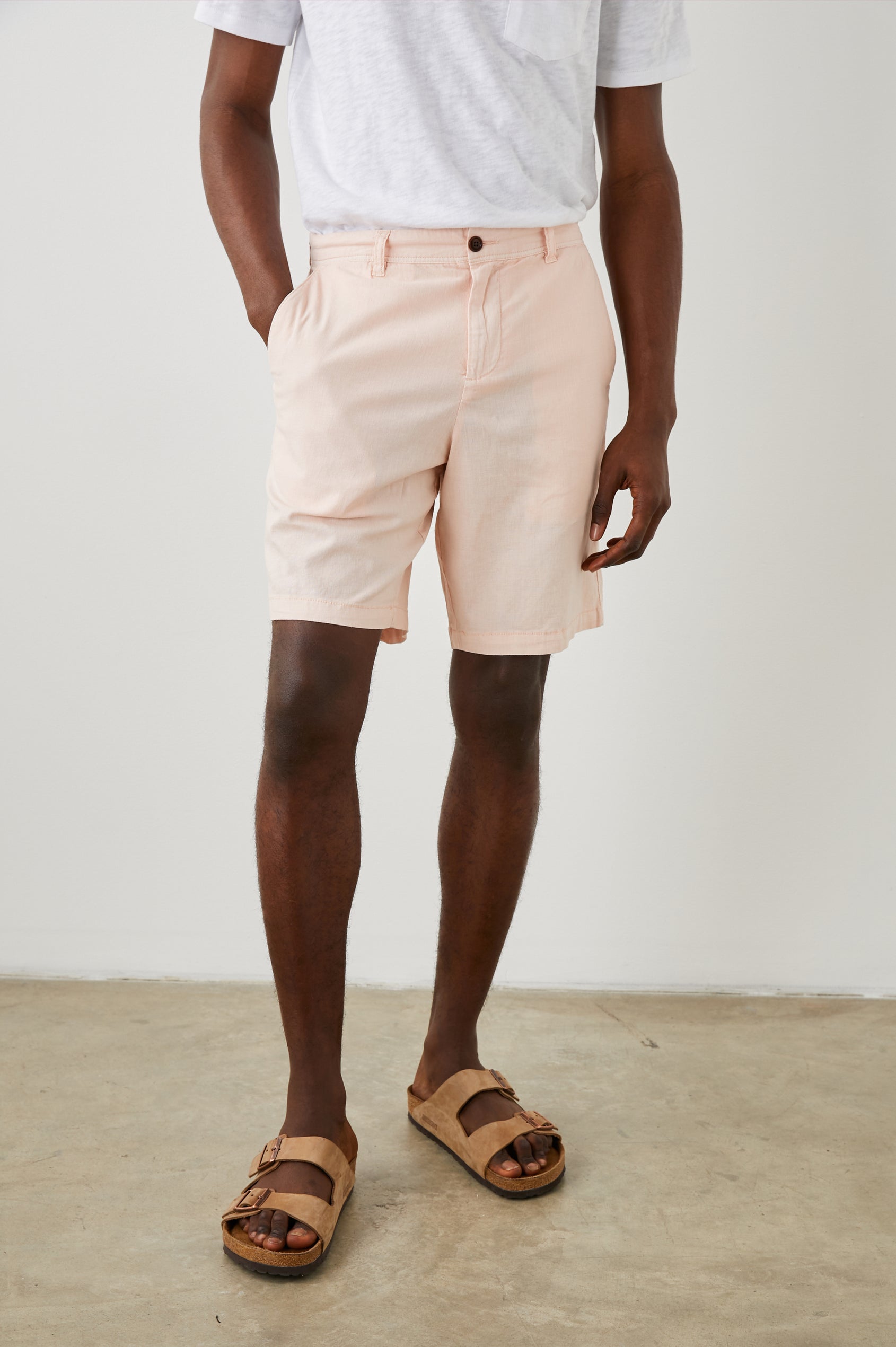Boden Knee-Length Shorts with Belt Loops, Two Front Pockets and Two Back Button Welt Pockets in Prawn Colorway - Front View Featured on Model