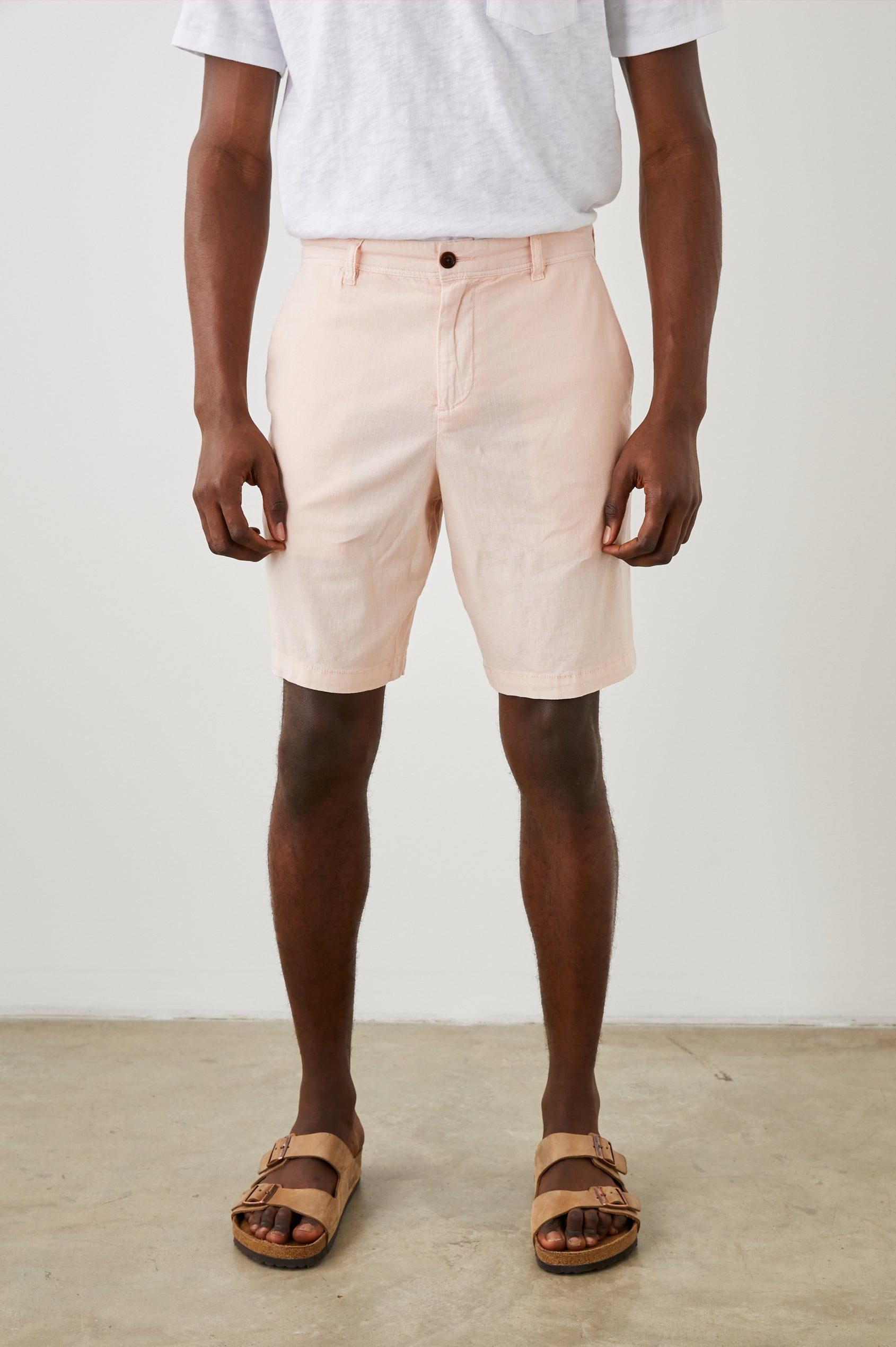 Boden Knee-Length Shorts with Belt Loops, Two Front Pockets and Two Back Button Welt Pockets in Prawn Colorway - Front View Featured on Model