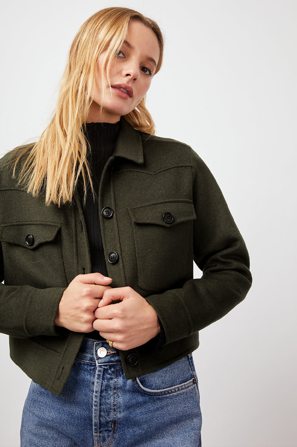 Easton Slightly Cropped Jacket with Button Closure, Two Chest Button Flap Pockets and Western Yokes in Olive Colorway - Front View Featured on Model