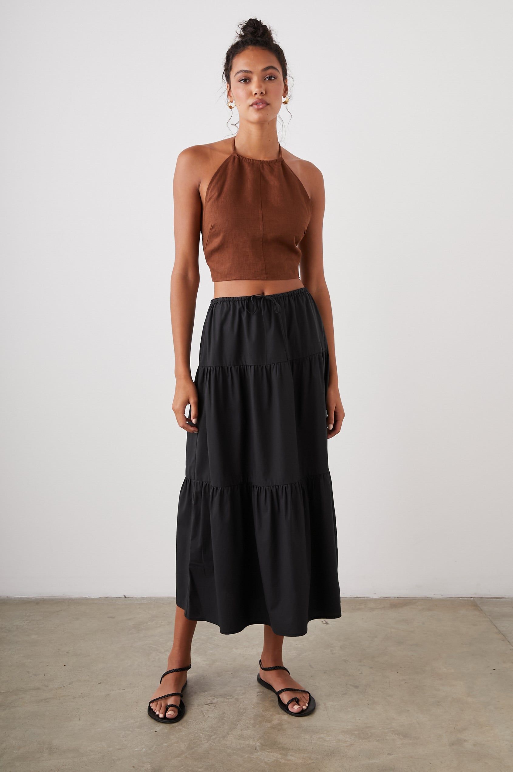 Mary Tiered Midi Skirt with a Drawstring Waist in Black Colorway - Front Full Body View Featured on Model