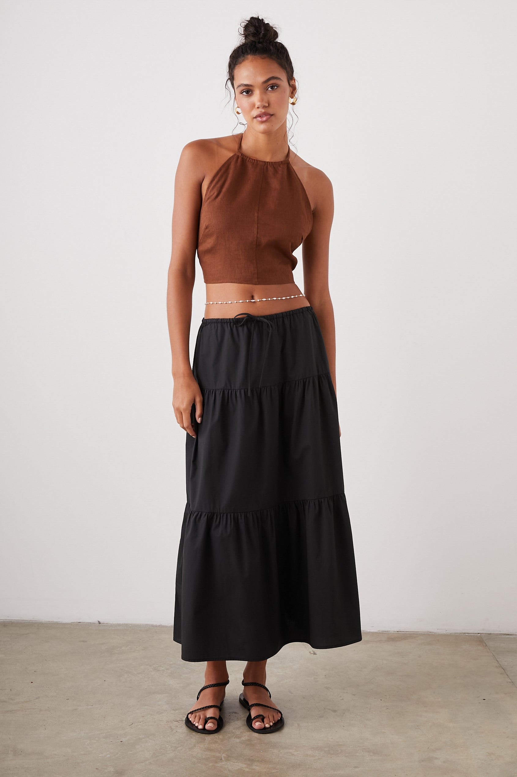 Mary Tiered Midi Skirt with a Drawstring Waist in Black Colorway - Front Full Body View Featured on Model