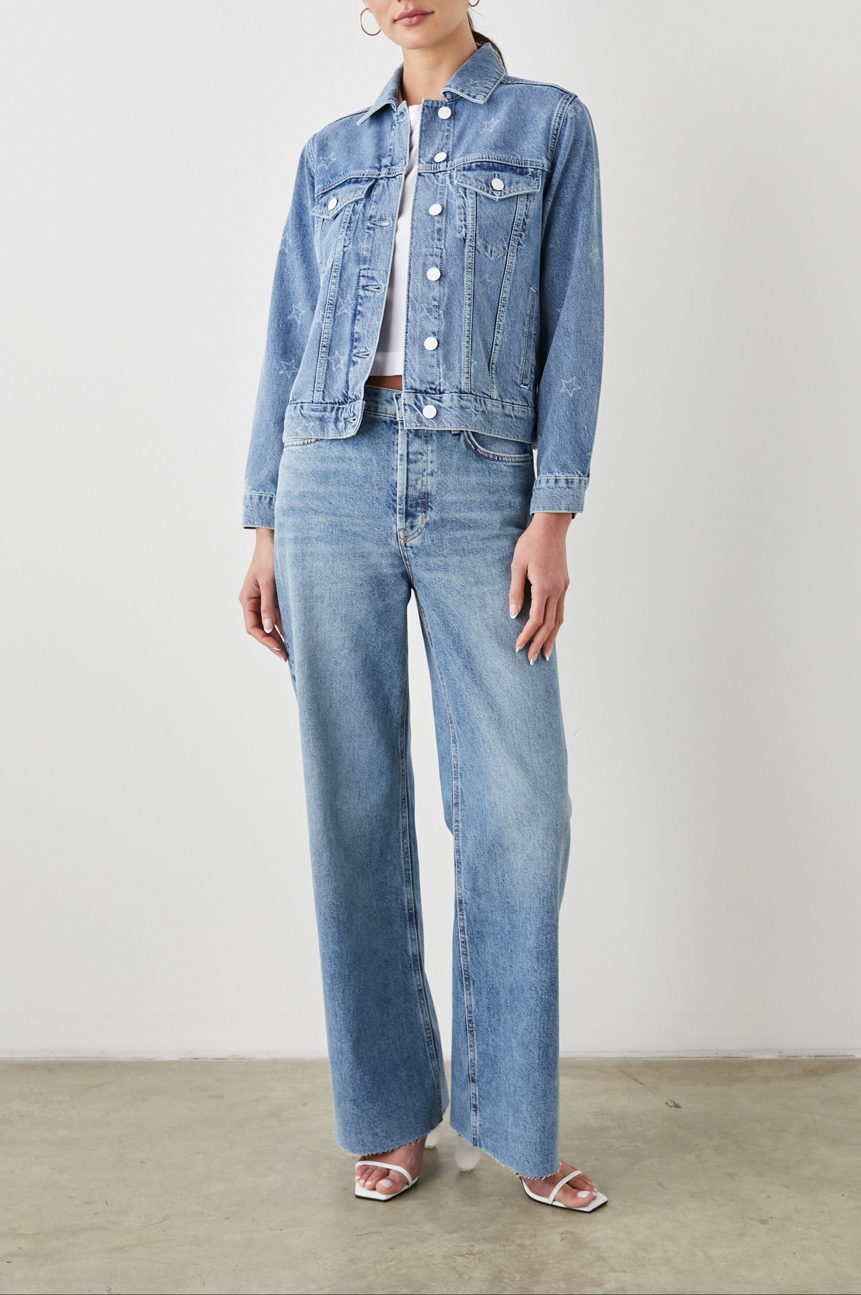 Mulholland Denim Jacket with Button Closure, Two Chest Button Flap Pockets, Two Front Pockets, Adjustable Button Straps on Hem in Lady Liberty Colorway, with White Stars - Front Full Body View Featured on Model  