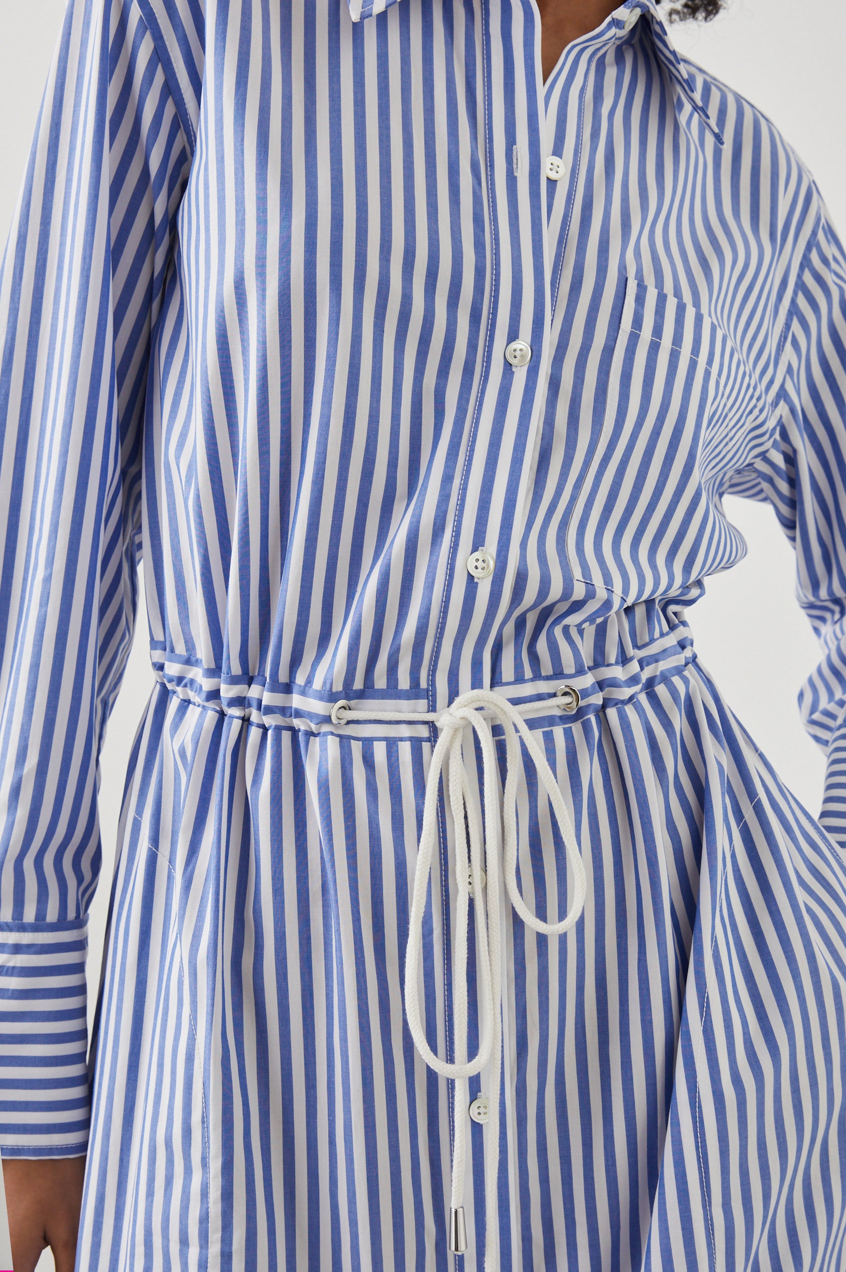 Shivonne Long-Sleeve Midi Dress with a Full Button Front, a Collar and a Drawcord Waist in Rivera Stripe Colorway, Blue and White Vertical Stripes - Front View Featured on Model