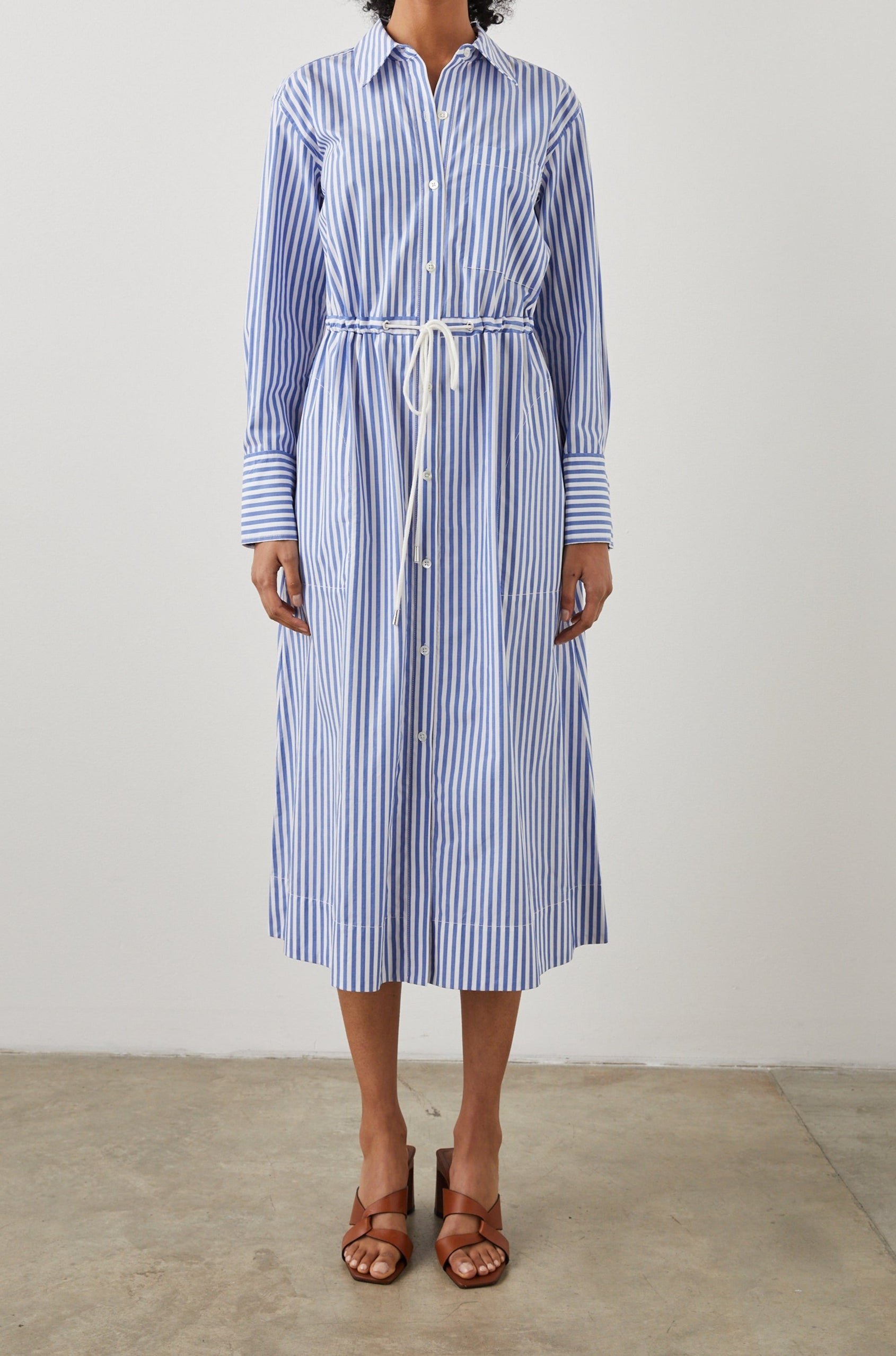 Shivonne Long-Sleeve Midi Dress with a Full Button Front, a Collar and a Drawcord Waist in Rivera Stripe Colorway, Blue and White Vertical Stripes - Front Full Body View Featured on Model