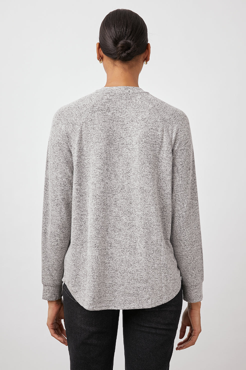Thalia Long-Sleeve T-Shirt with a V Neck and a High Low Hem in Melange Grey Colorway - Back View Featured on Model 
