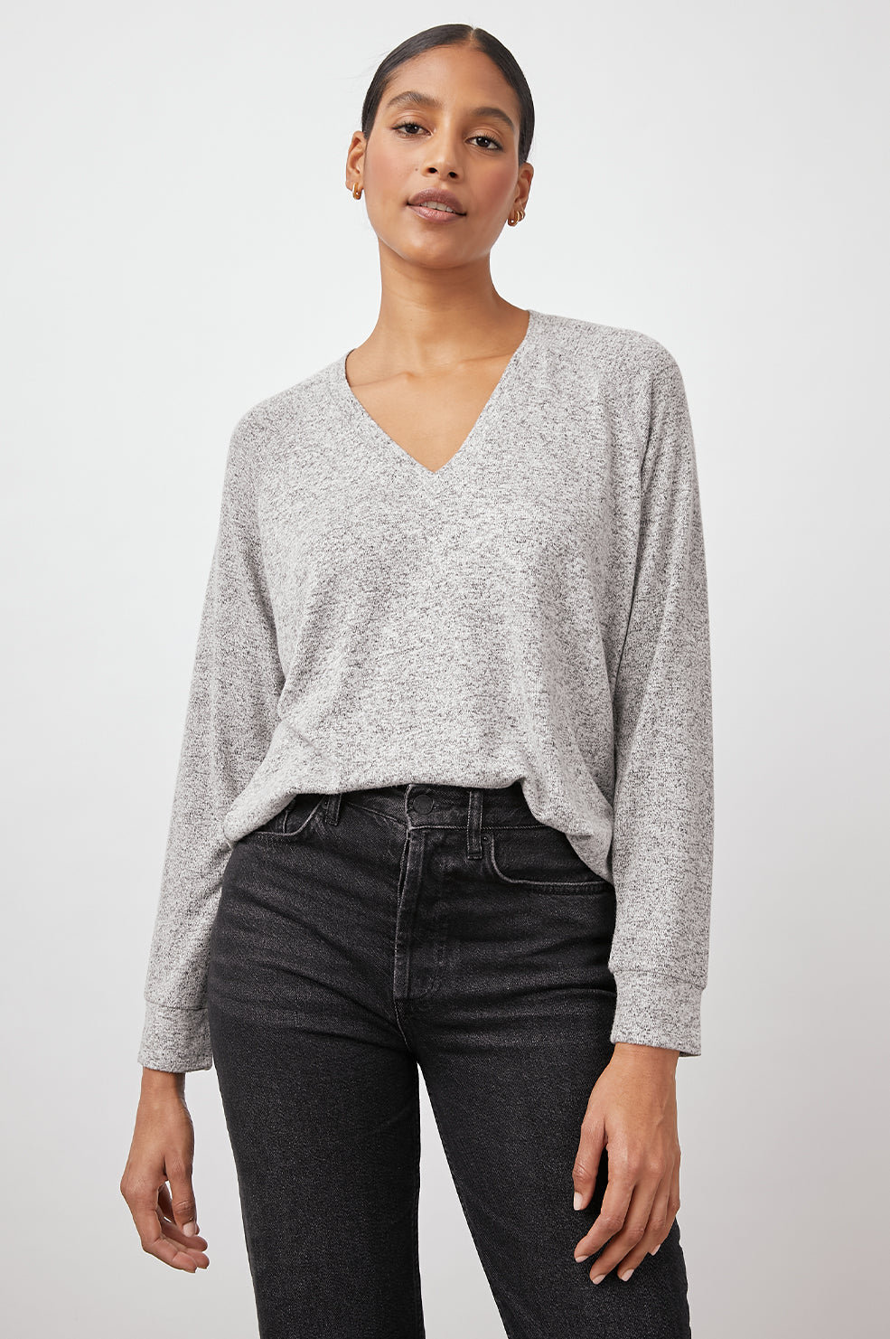 Thalia Long-Sleeve T-Shirt with a V Neck and a High Low Hem in Melange Grey Colorway - Front View Featured on Model 